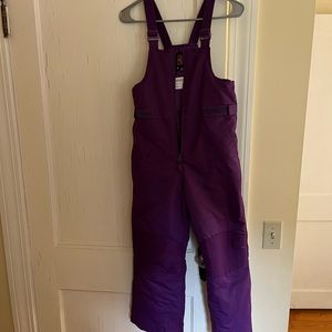Barely used girls 7/7 snow pants/bib in purple.